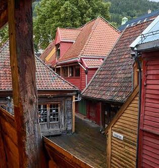 Wooden houses in the Bryggen area by Pixabay