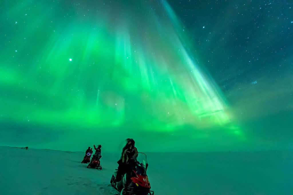 Northern Lights during a snowmobile trip by Orjan Bertelsen, Hurtigruten