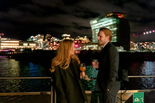 Oslo Dinner Cruise Couple on Deck with Munch Museum By Brim Explorer